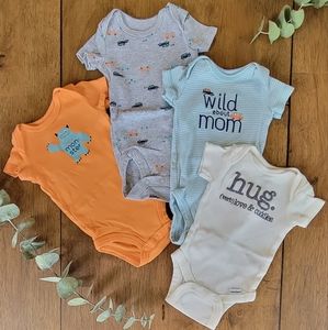 4pc Newborn Carter's mic Onsie Lot